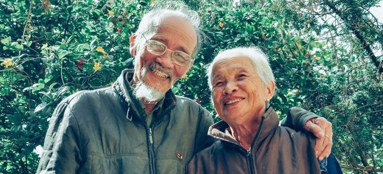 An elderly man and woman