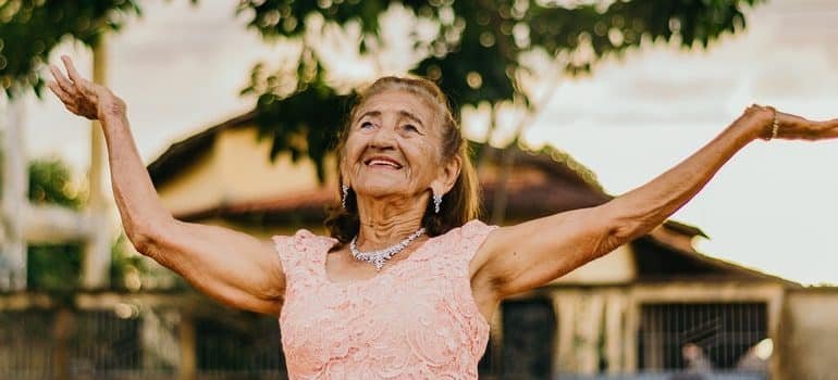 A senior woman dancing