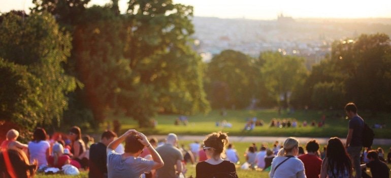 people witting in the park