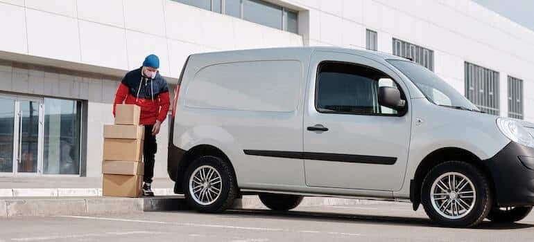 A man loading a van