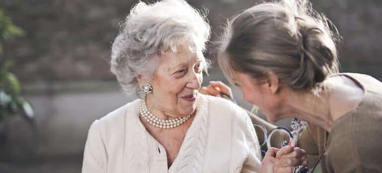 Two women talking to each other