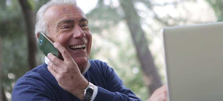 A senior talking on the phone