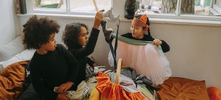 Kids getting ready for Halloween;